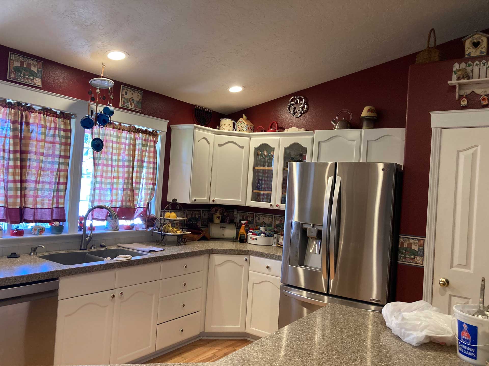 Real Busy Bee interior painting photo: kitchen with freshly painted burgundy walls